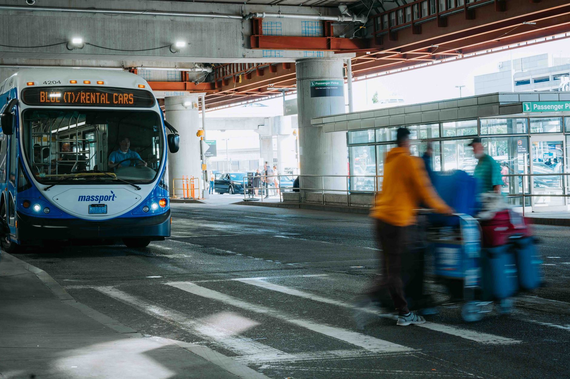 Passengers boarding a paid shuttle bus near an Orlando resort