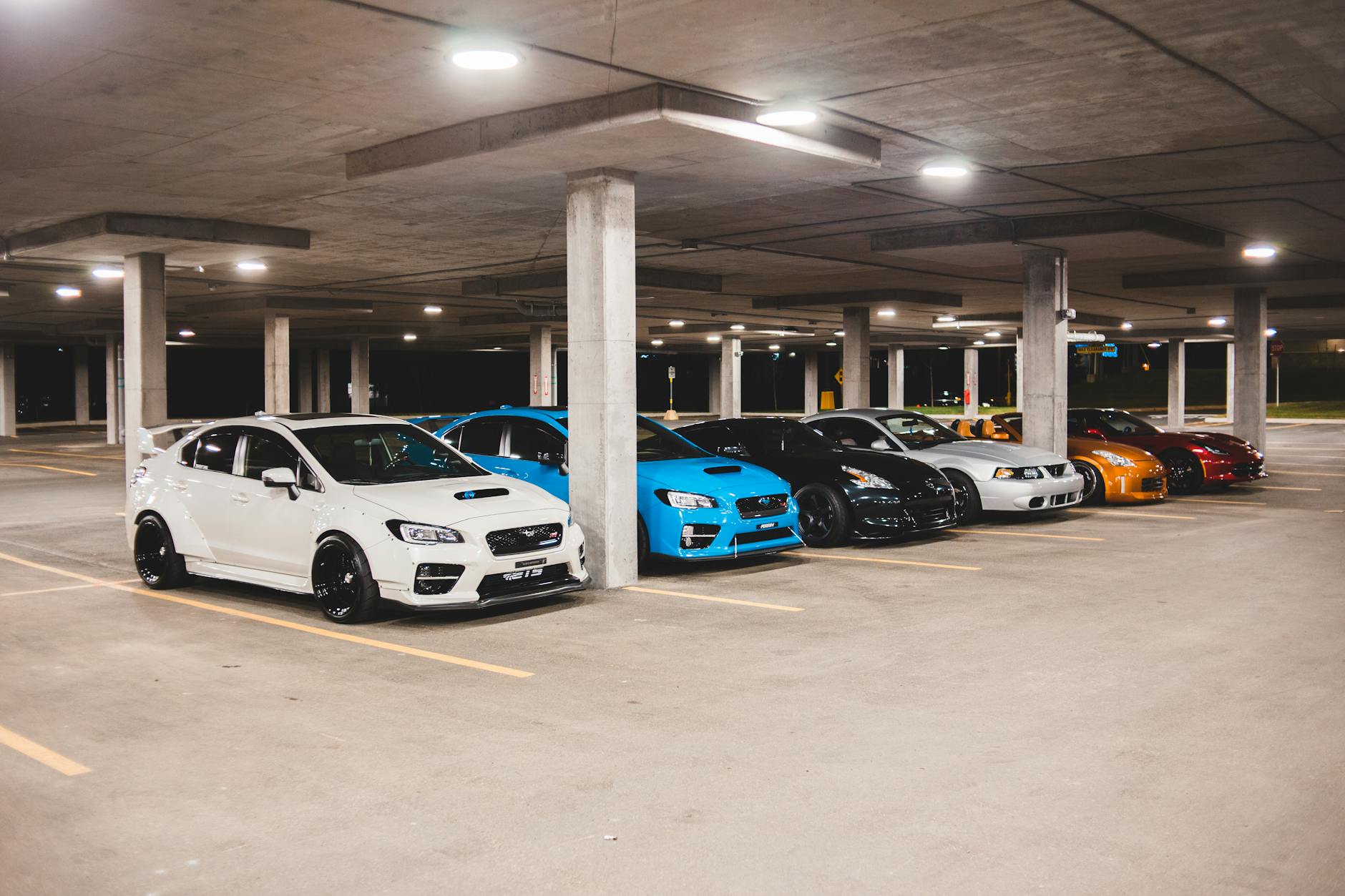 rows of cars parked in a multi-level theme park parking garage in Orlando