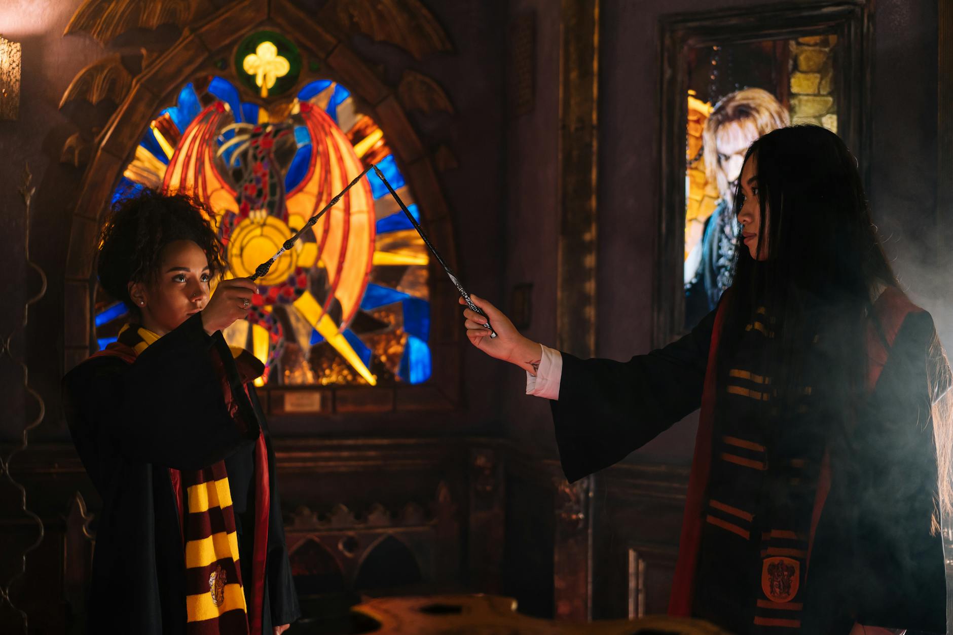 Teen casting an interactive wand spell in the Wizarding World
