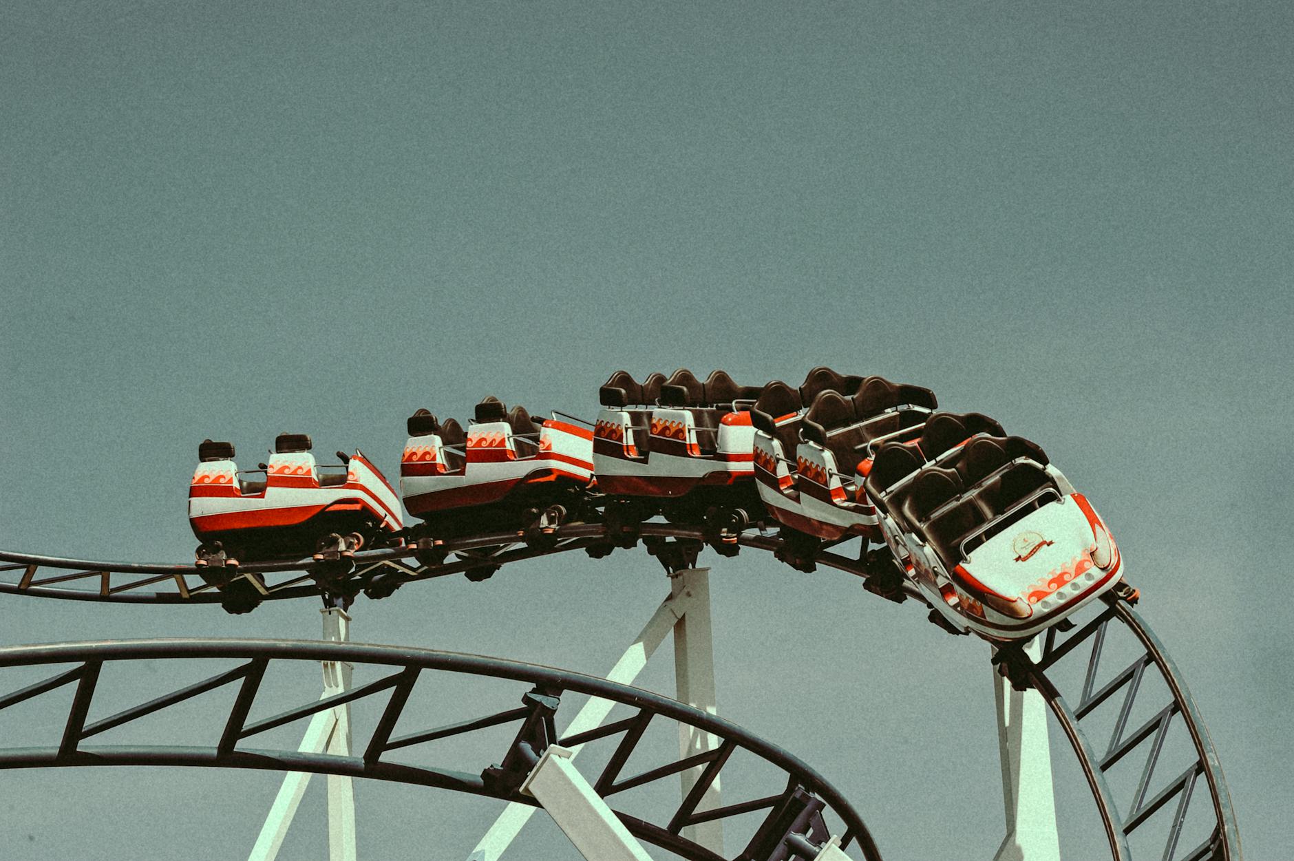 Riders inverted on the Kraken floorless roller coaster at SeaWorld Orlando