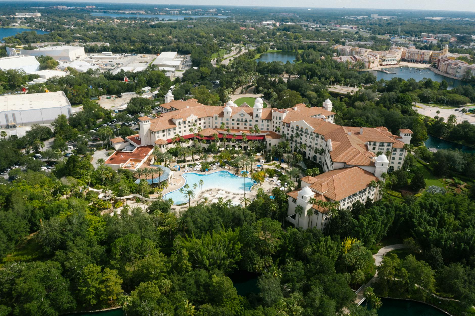 Resort hotel swimming pool with palm trees near Universal Orlando