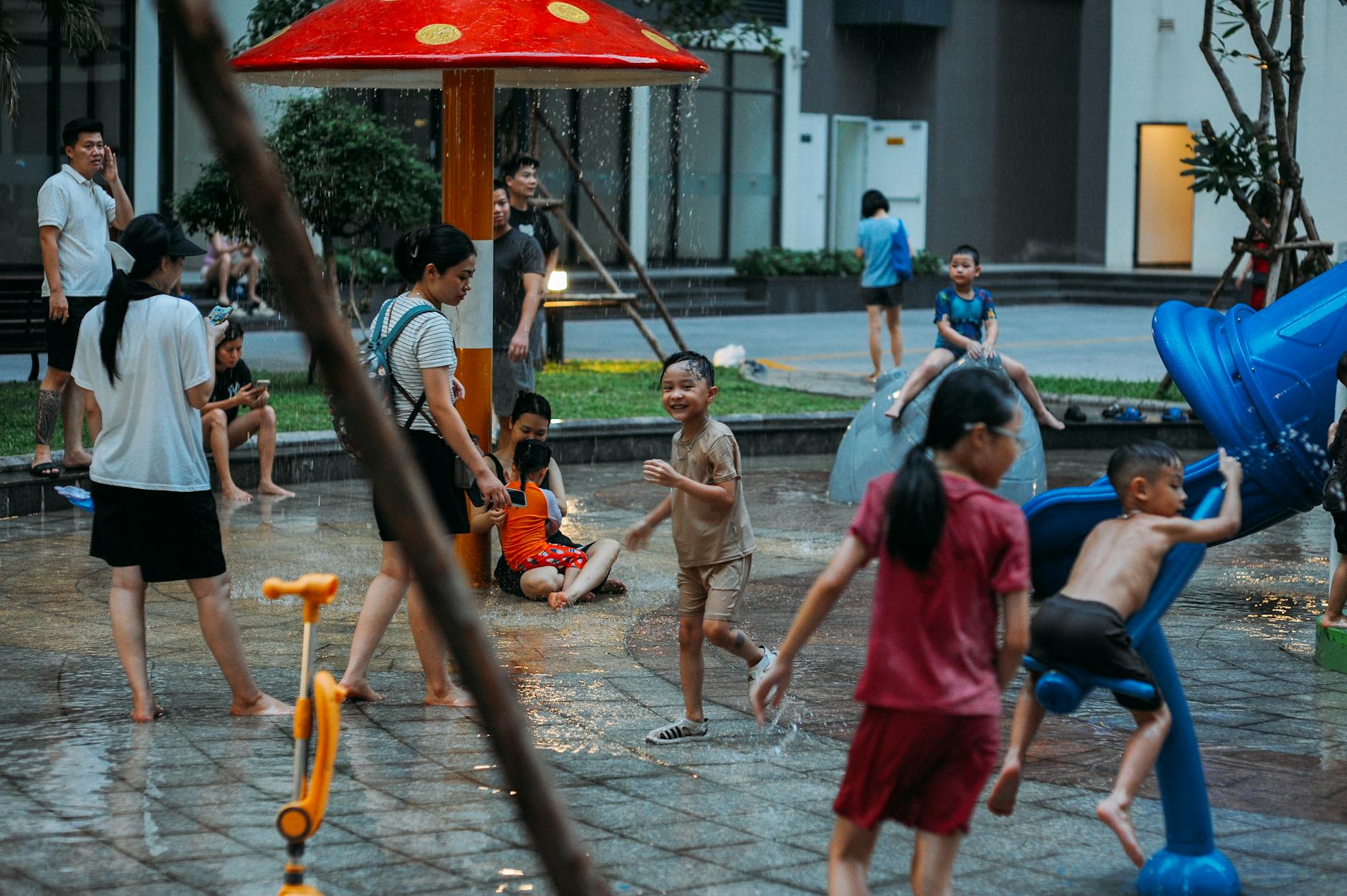 children playing at a colorful water park kids splash area